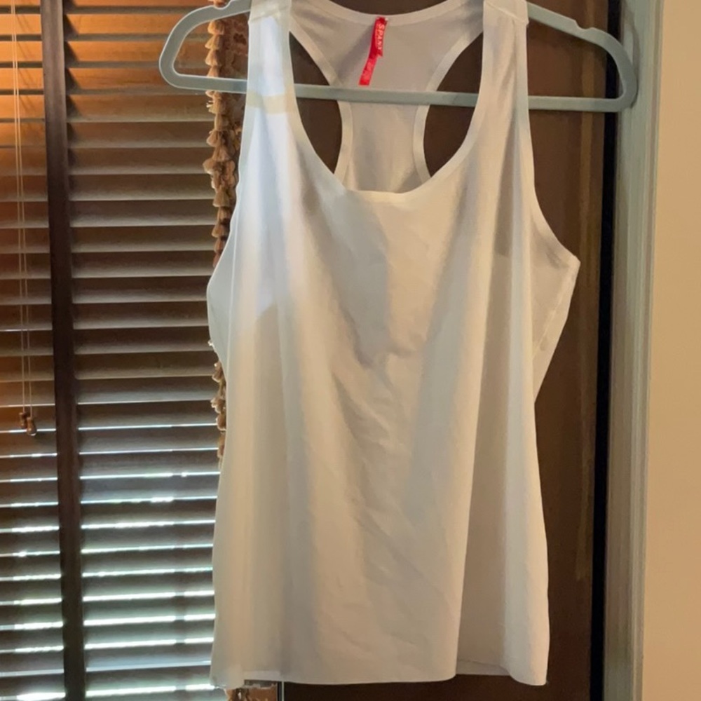 SPANX White Sleeveless undershirt/Tank Top. 
Size XL, Never Worn.Mint condition